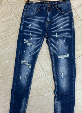 VAQUERO JEAN NEGRO DESGASTADO CON DETALLES PINTADOS