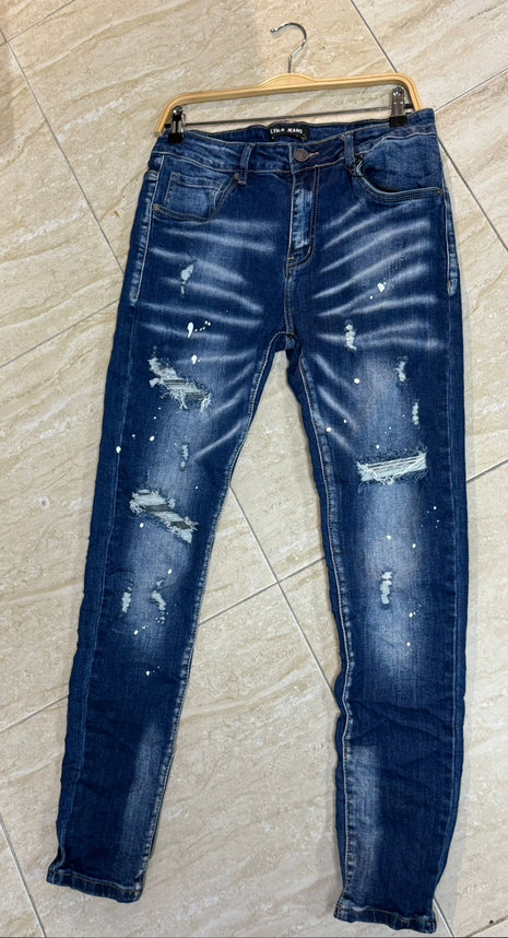 VAQUERO JEAN NEGRO DESGASTADO CON DETALLES PINTADOS